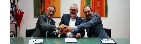 Firma del Acuerdo con IQS